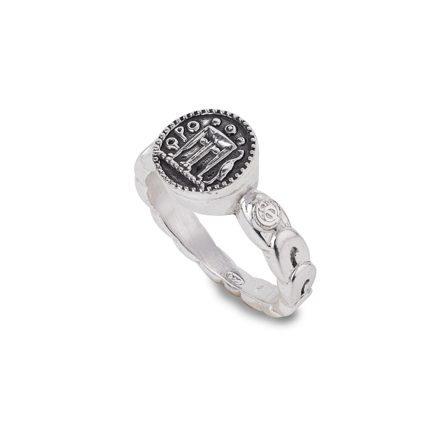 Anello con moneta centrale e greca